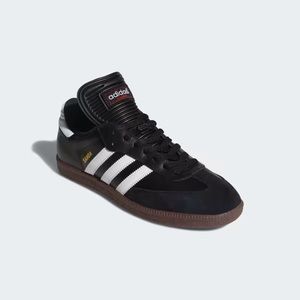 Adidas Samba in black/white color way. In men’s size 5.5/ women’s size 7